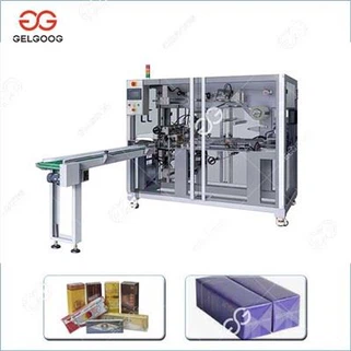 Kozmetički stroj za omatanje kutija